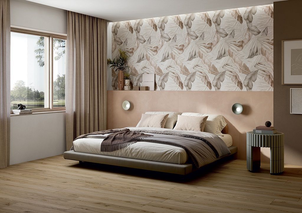 Una camera da letto con un letto grande e una finestra.