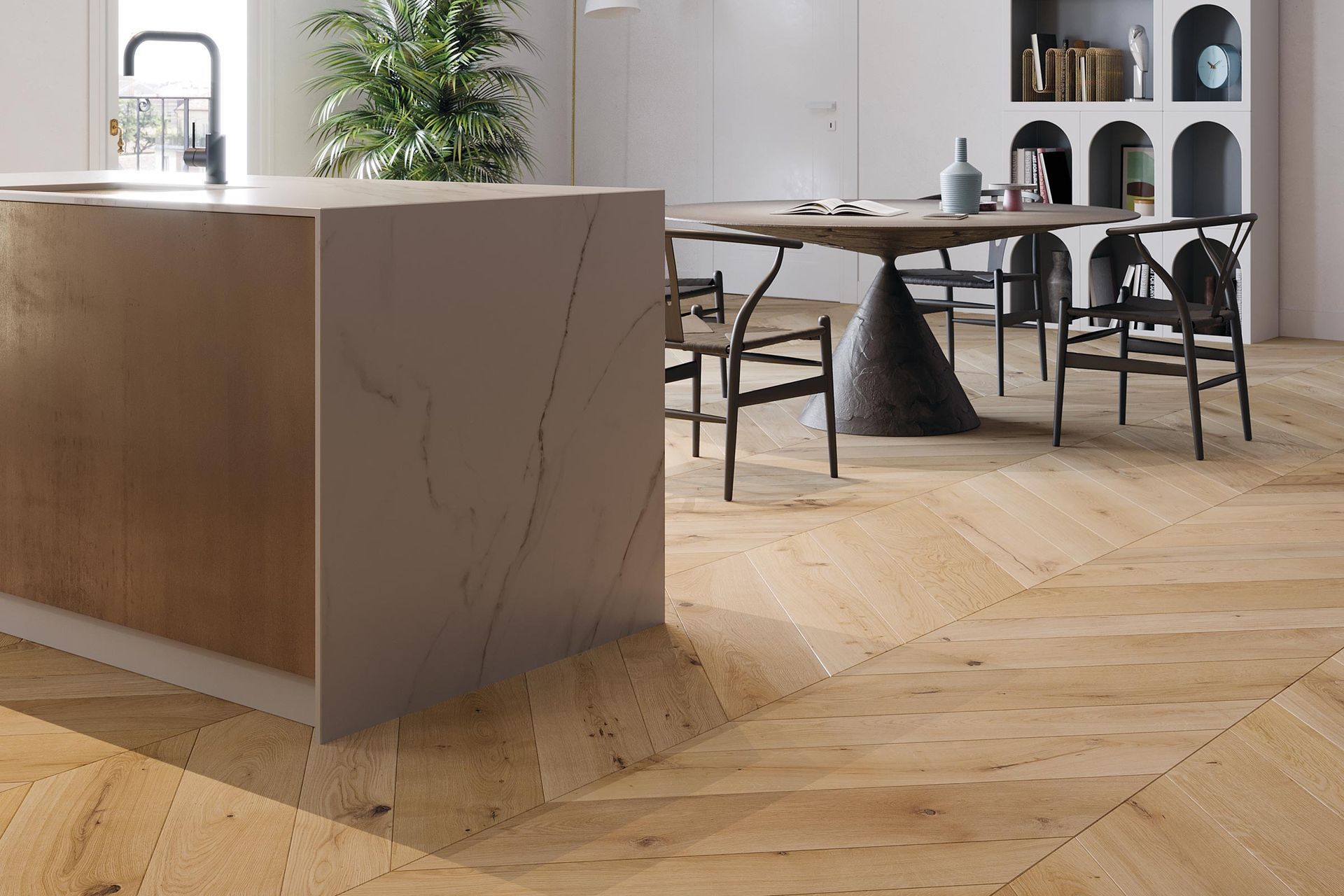 Una cucina con tavolo e sedie e pavimento in legno.