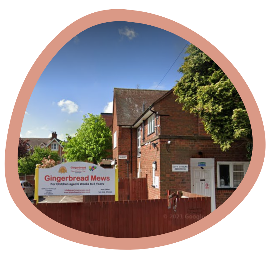 A building with a sign that says gingerbread mews