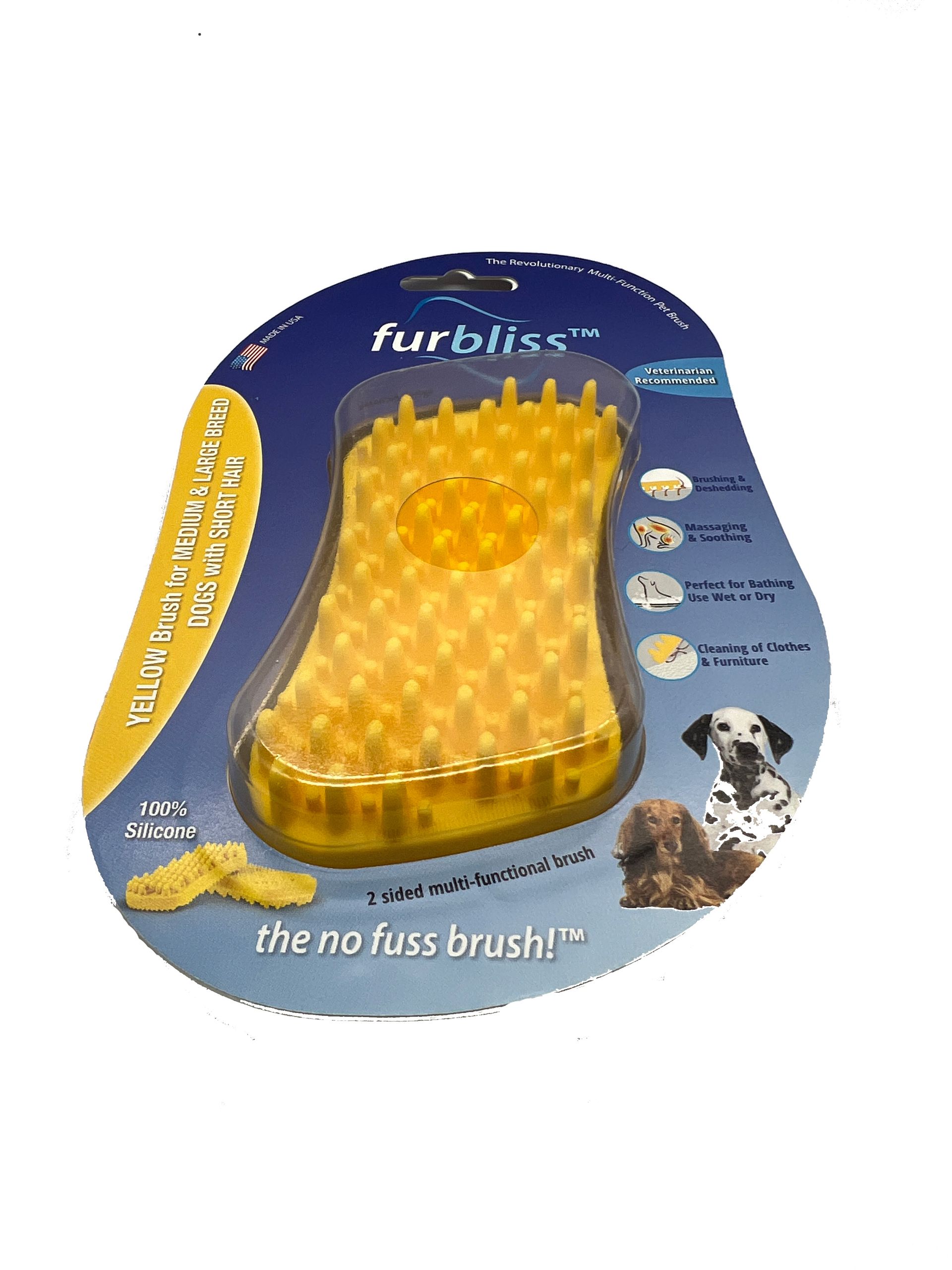 A dog brush in a package with a picture of a dog on it.