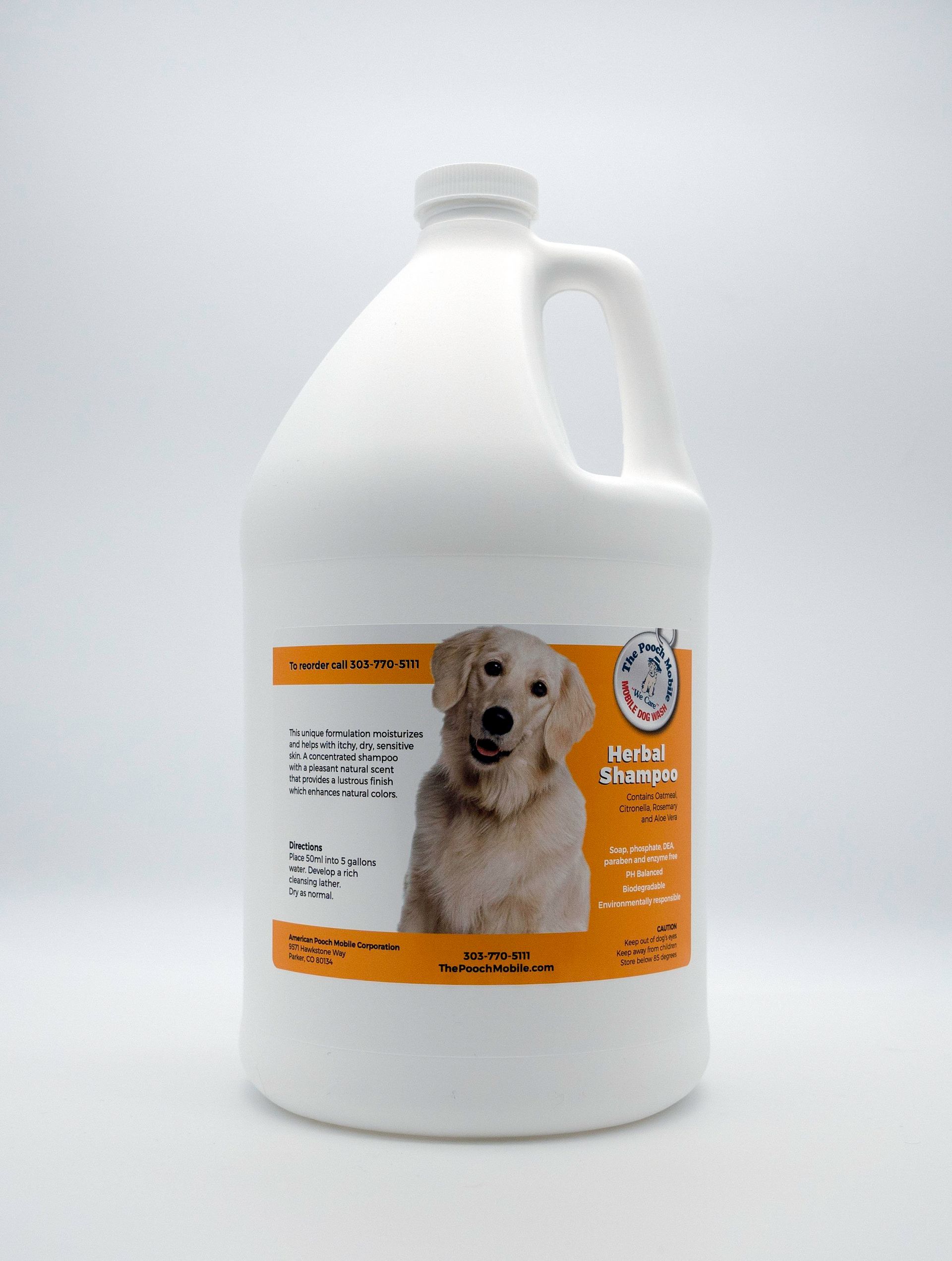 A gallon of dog shampoo with a picture of a dog on the label.