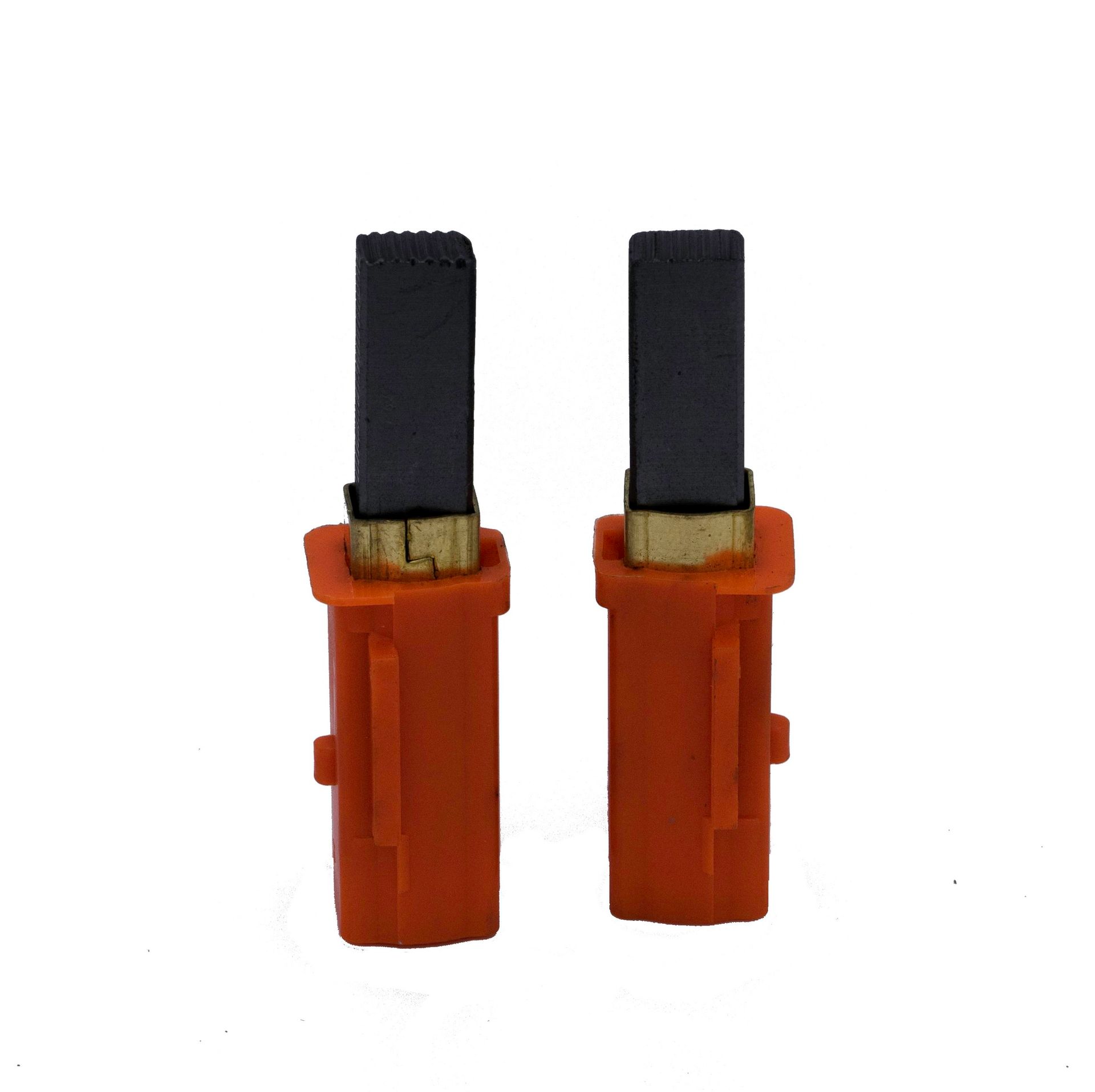 A pair of orange brushes on a white background.