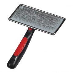 A stainless steel brush with a red handle on a white background.