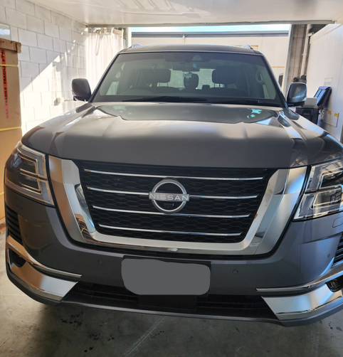 A Row Of Trucks Are Parked In A Parking Lot — Australian Specialised Machinery Glass In Mount Louisa, QLD