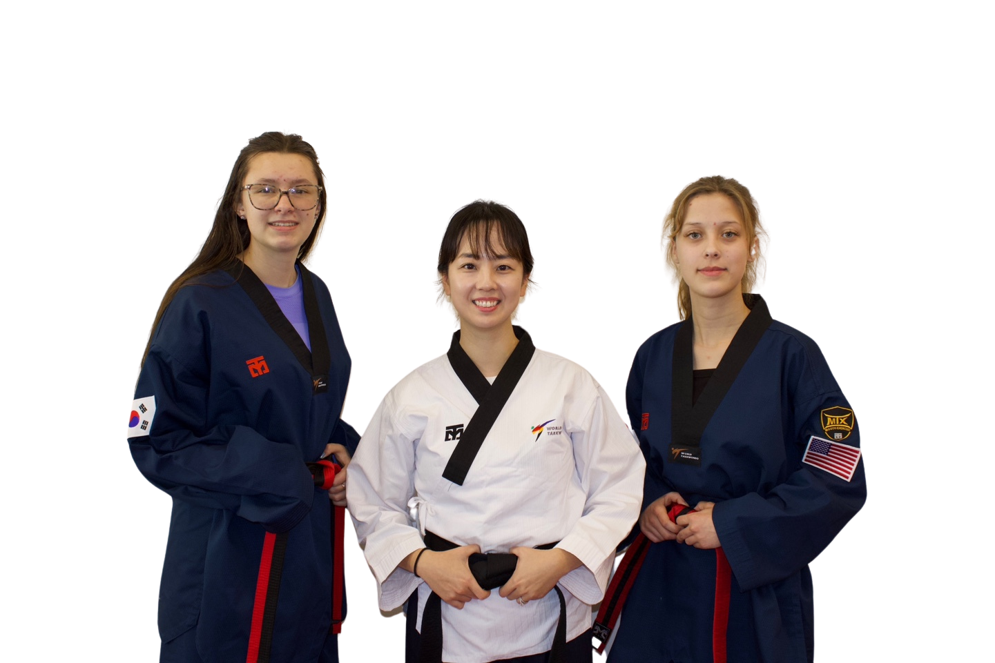 a group of children are practicing martial arts together .