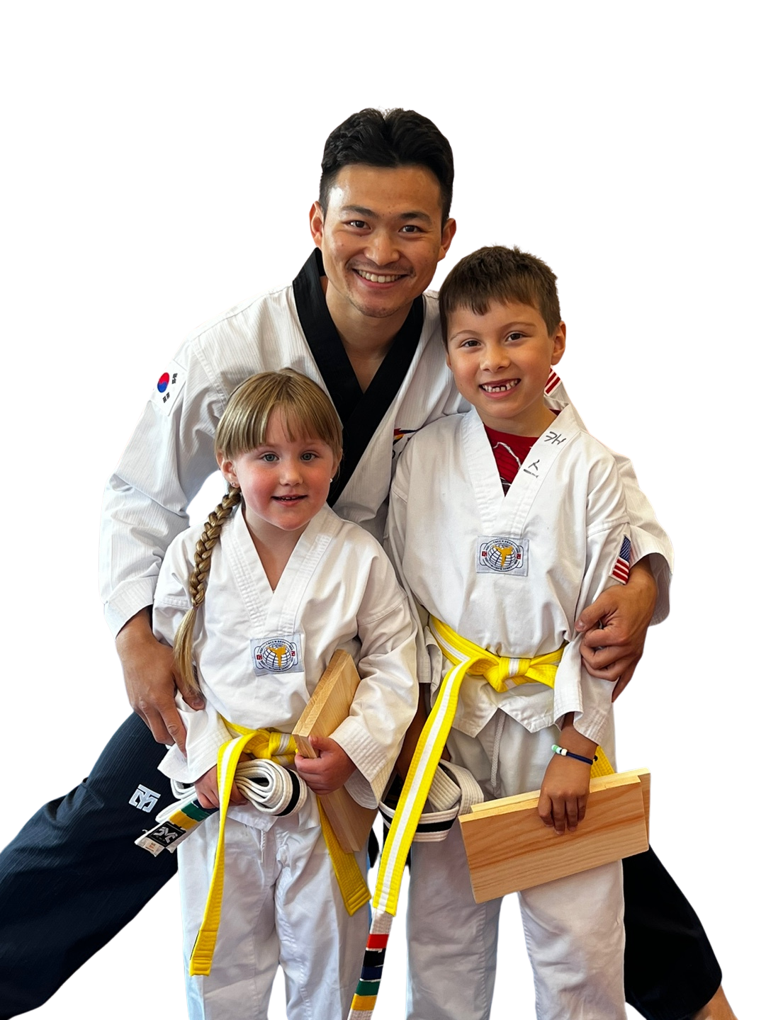 A boy and a girl are practicing karate together.