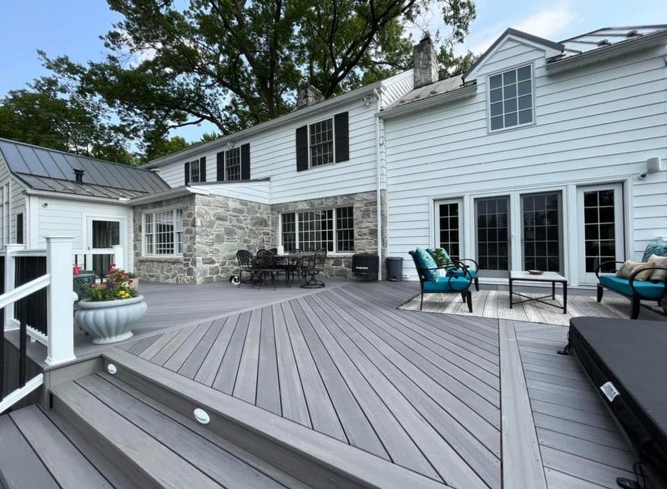 Lancaster PA custom deck with hottub and pool area, vinyl railing and composite decking with beautiful yard
