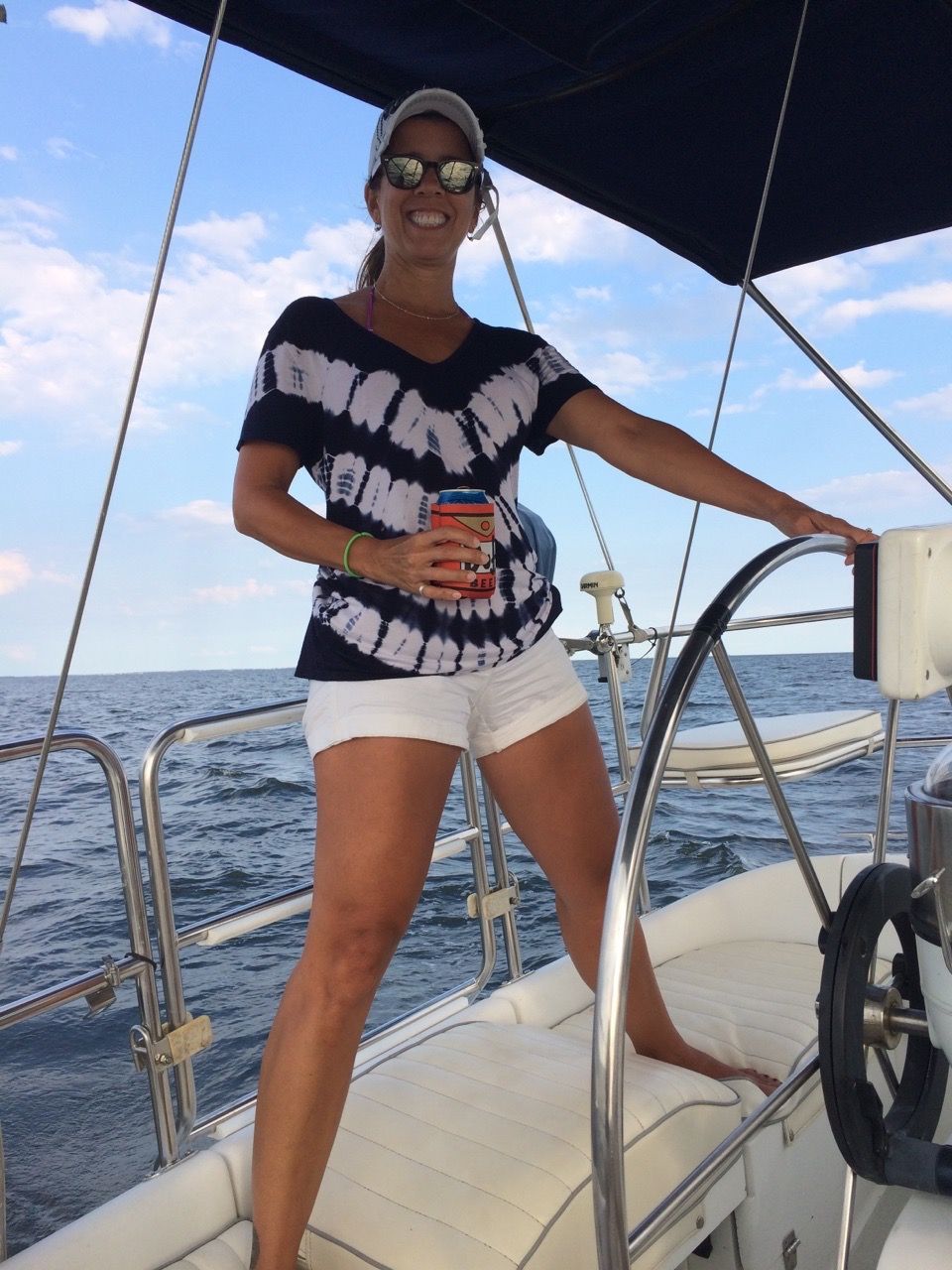 Woman at the helm of a sail boat | Tiny house DC