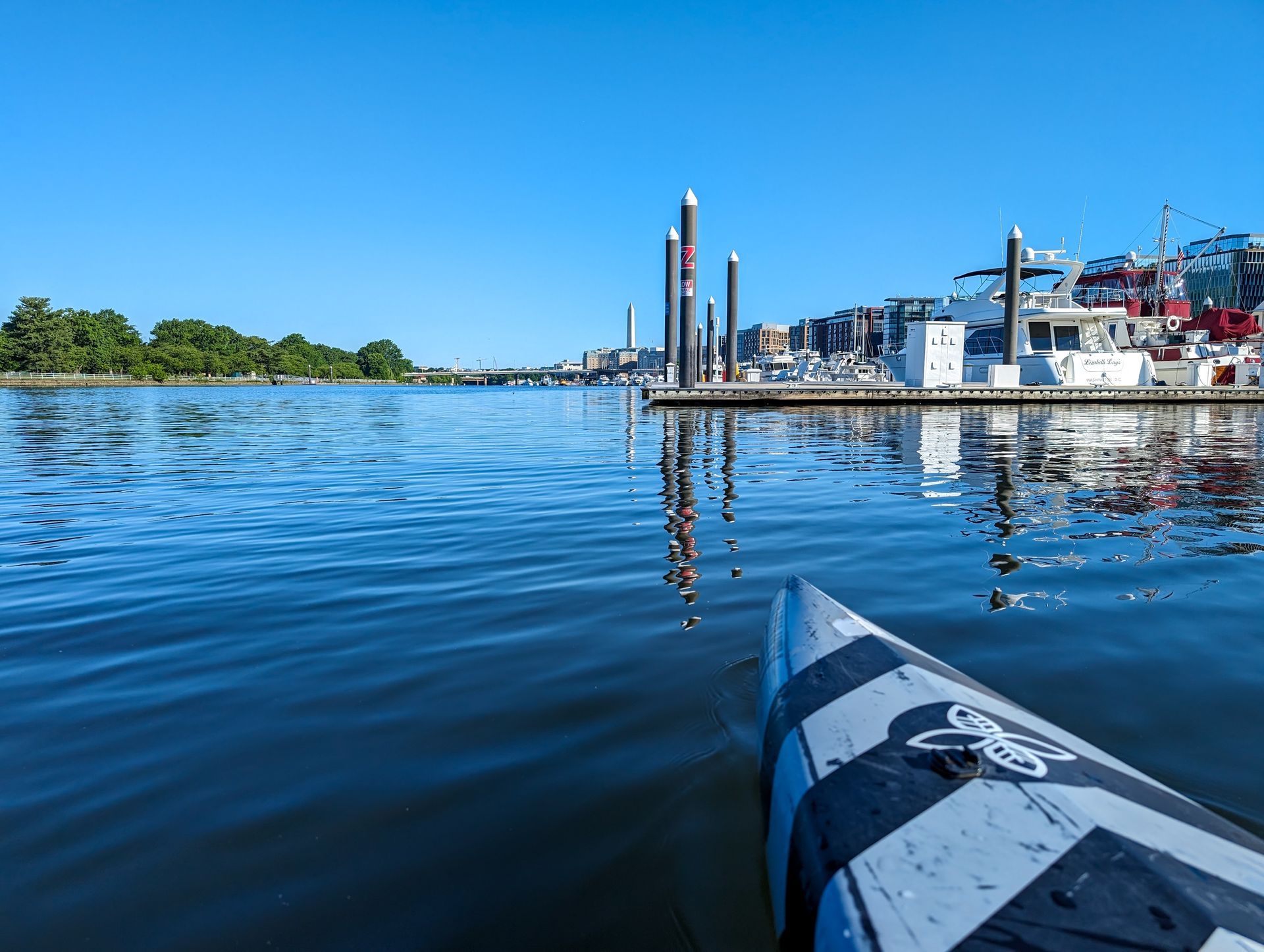 Piers and boats on the Washington Channel from the perspective of a kayak | Boats for sale Washington DC
