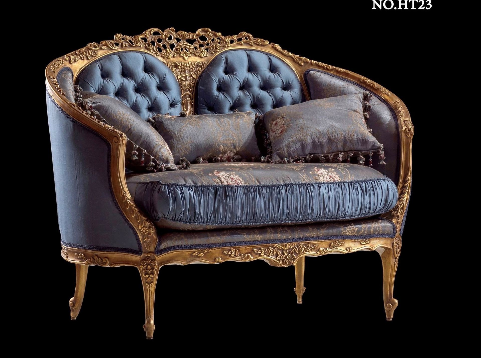 A blue and gold couch with the number ht23 on the bottom