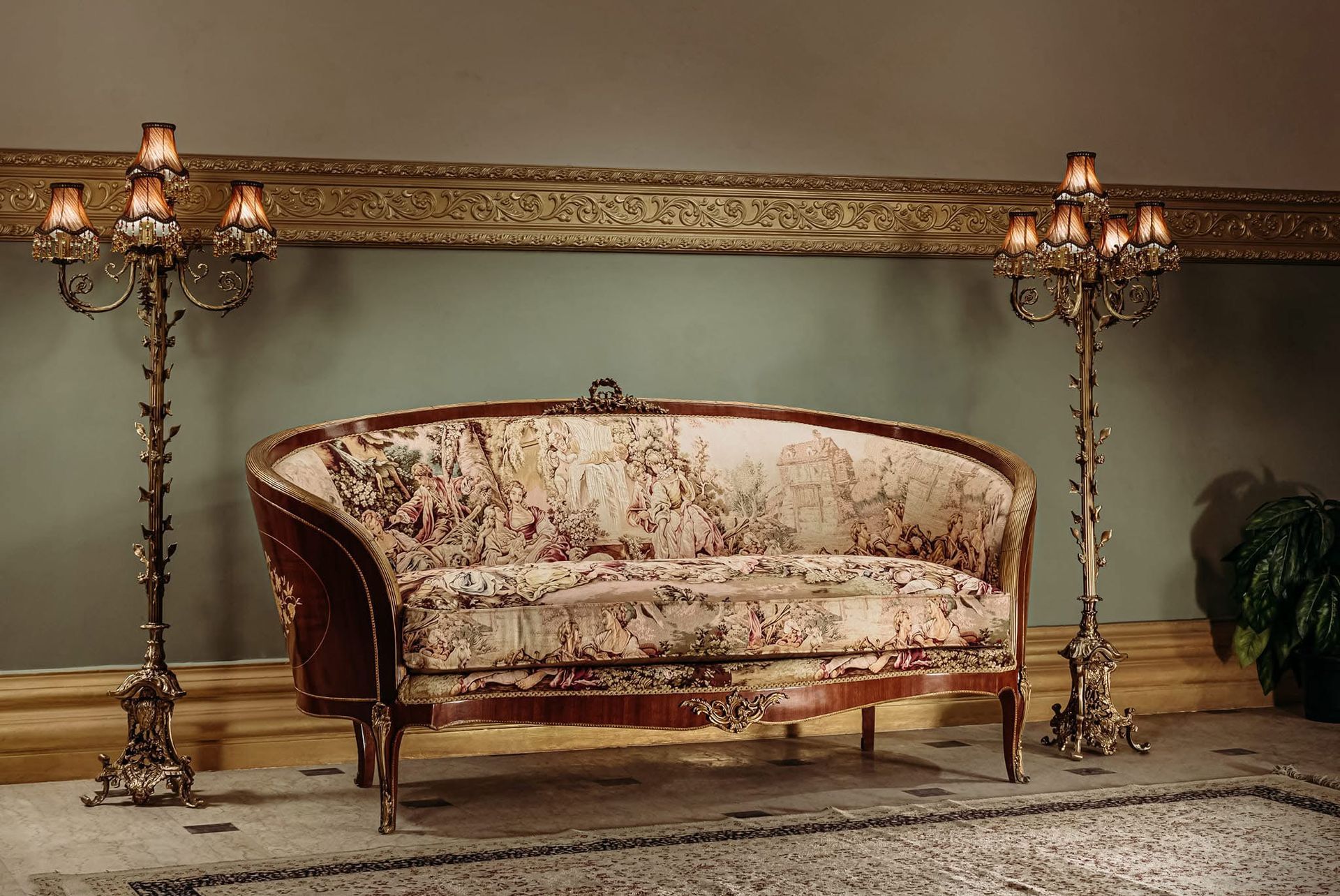 A living room with a couch and two lamps