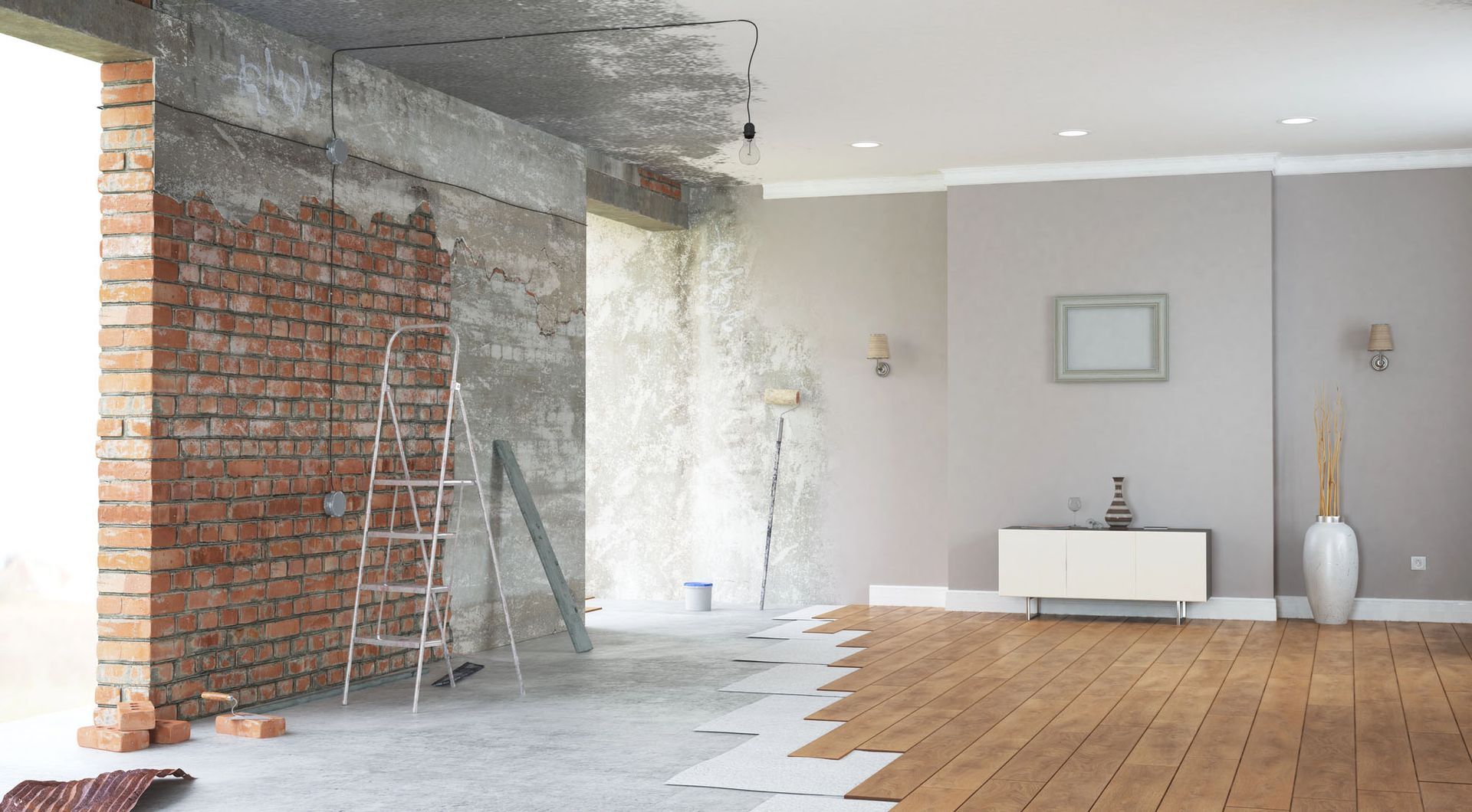 Soggiorno parzialmente ristrutturato con parete in mattoni a vista, soffitto in cemento e pavimento in legno.