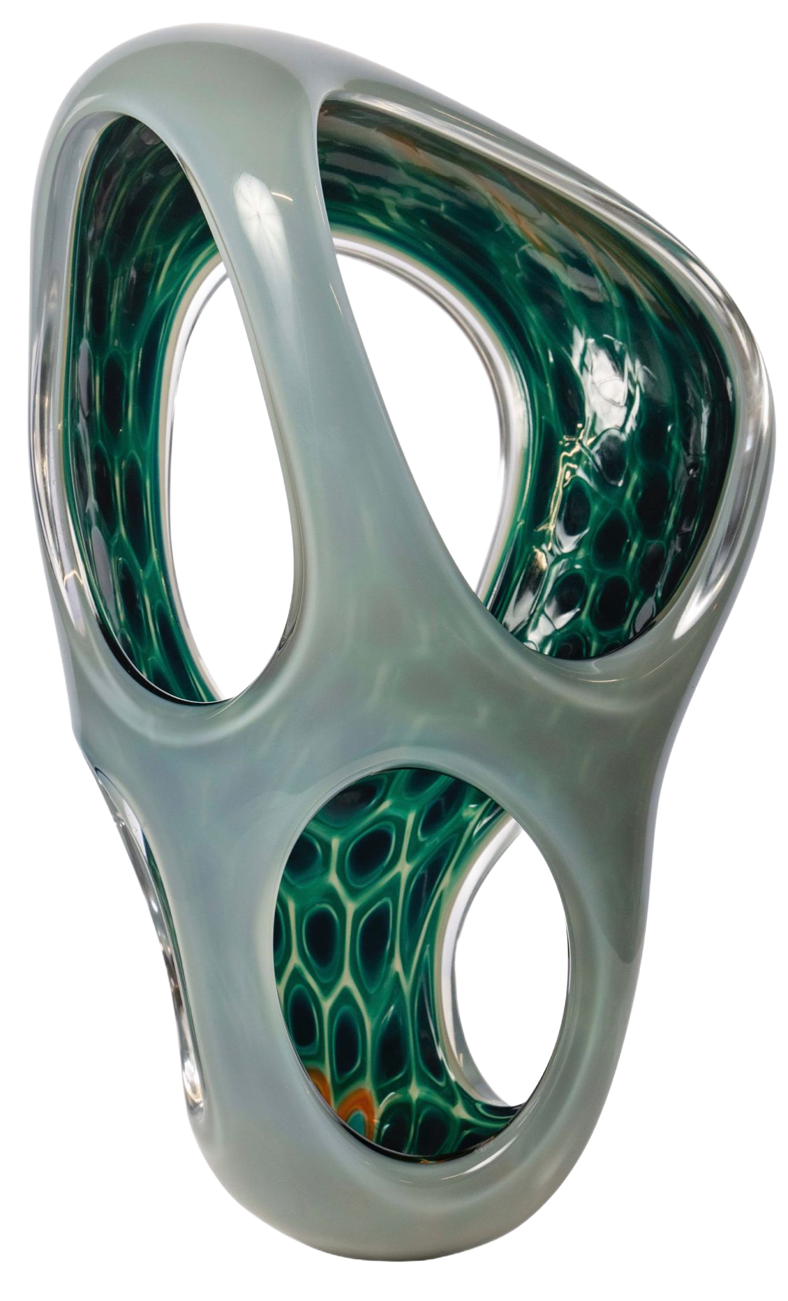 Abstract glass sculpture with swirling blue and white patterns, featuring multiple openings, atop a white marble pedestal.