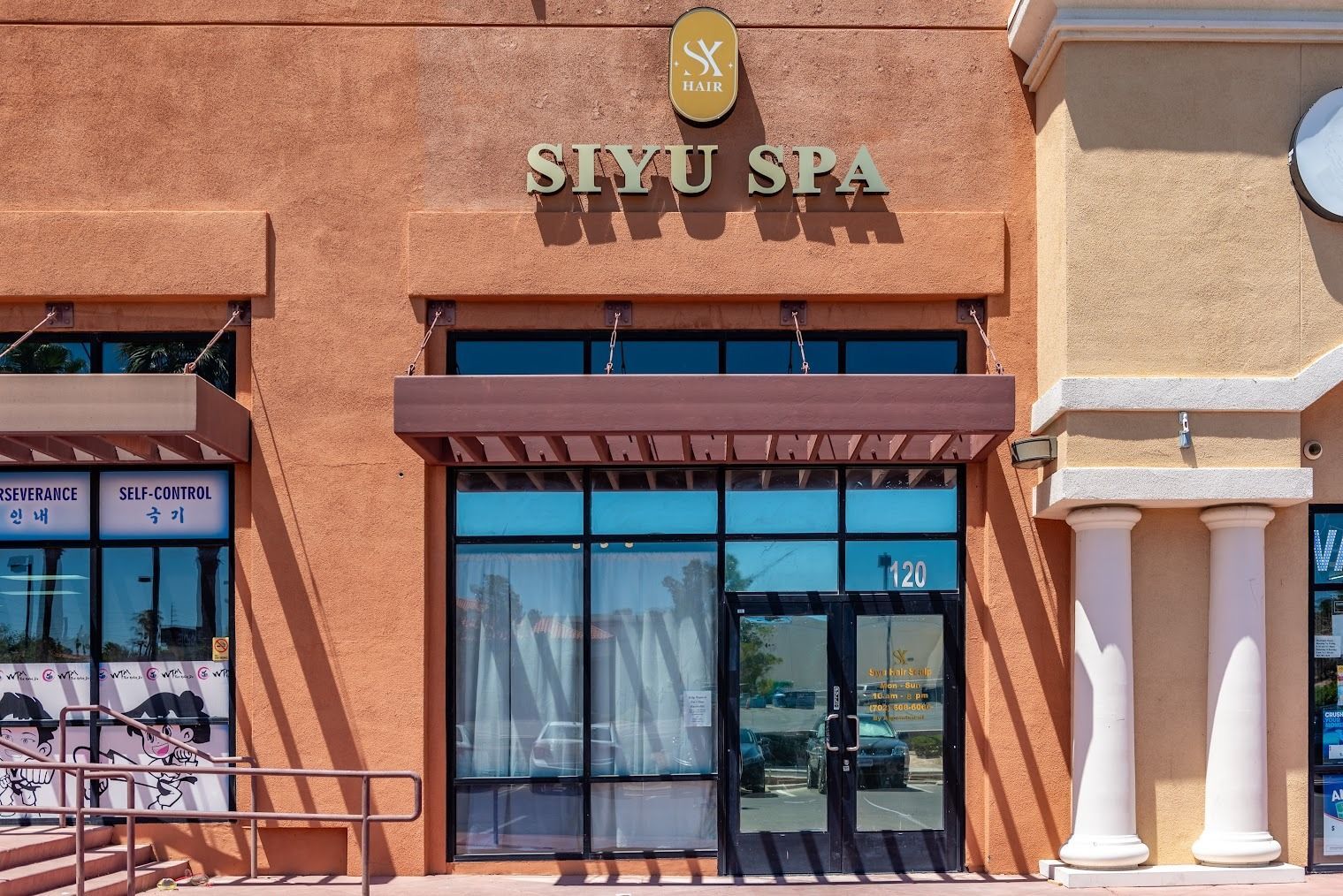 A building with a sign that says siyu spa