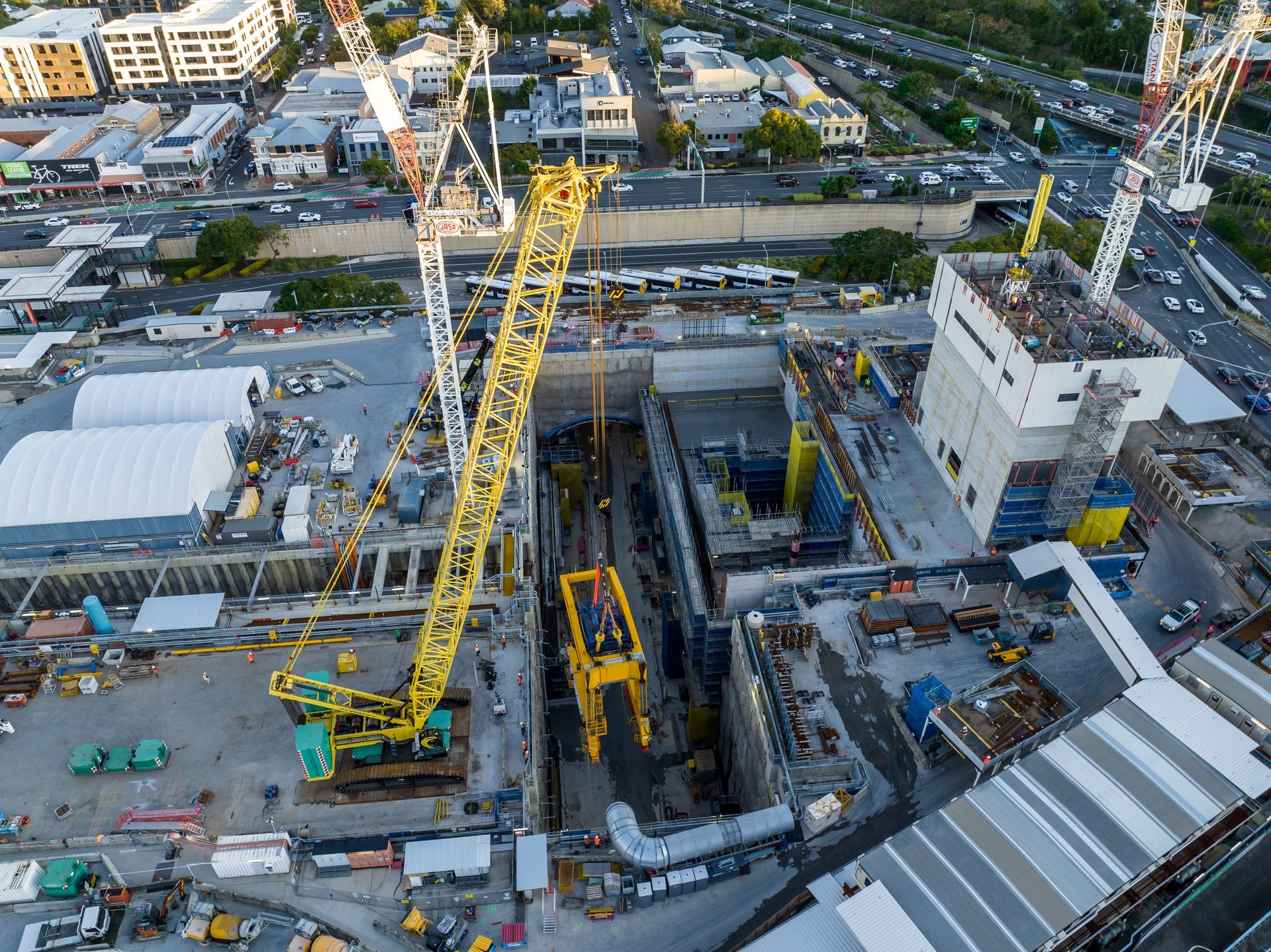 A Crane Lifting A Concrete Slab From A Flatbed Truck — East Coast Cranes in Ormeau, QLD