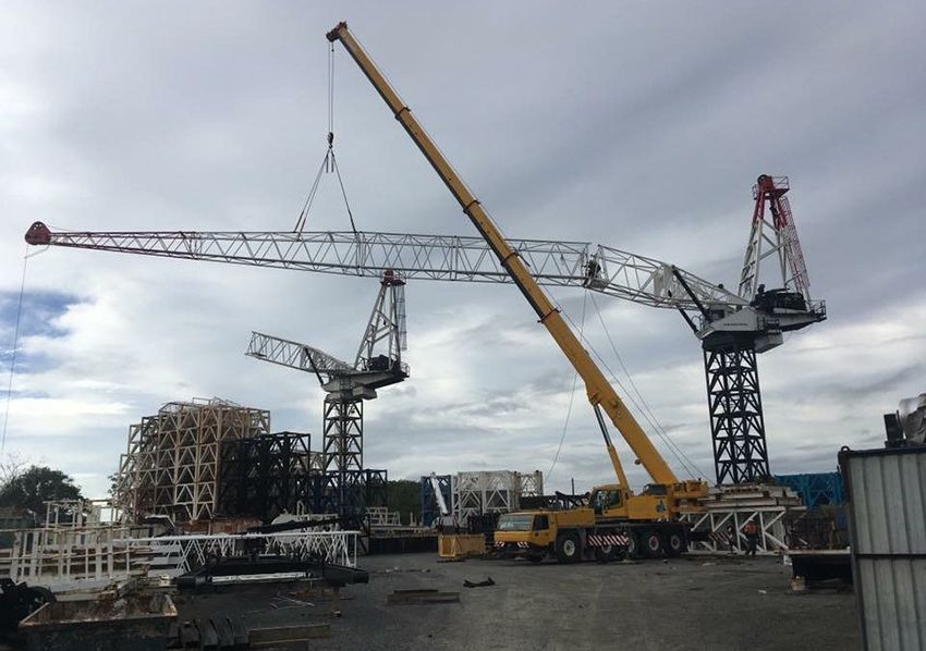 A Large Crane Is Lifting a Large Structure in A Construction Site — East Coast Cranes in Ormeau, QLD
