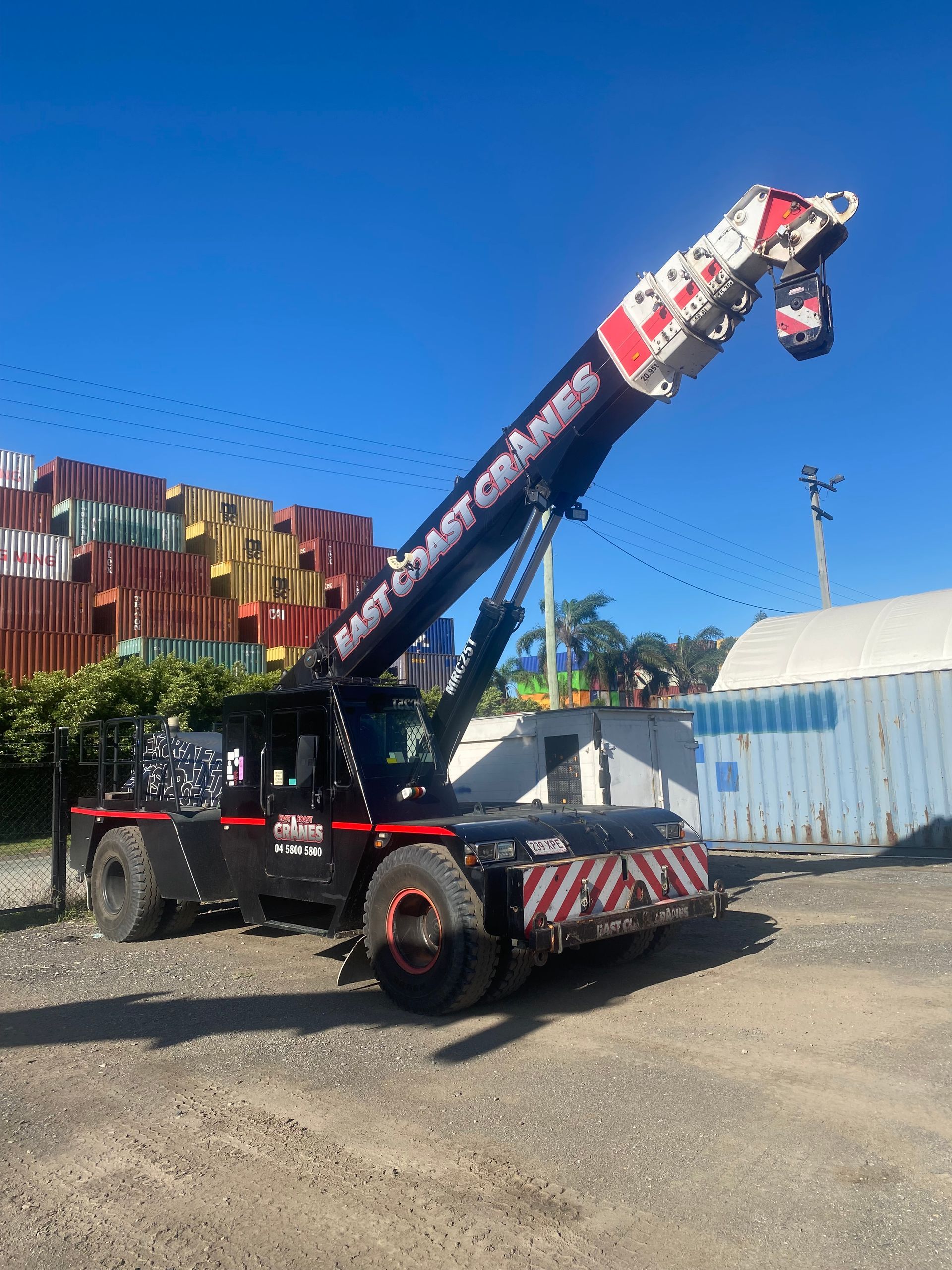 A Crane On Construction Site At Sunset — East Coast Cranes in Ormeau, QLD