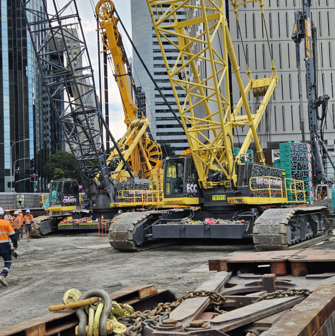 A Prominent Yellow Crane Towers Over a Construction Site — East Coast Cranes - Gold Coast in Ormeau, QLD