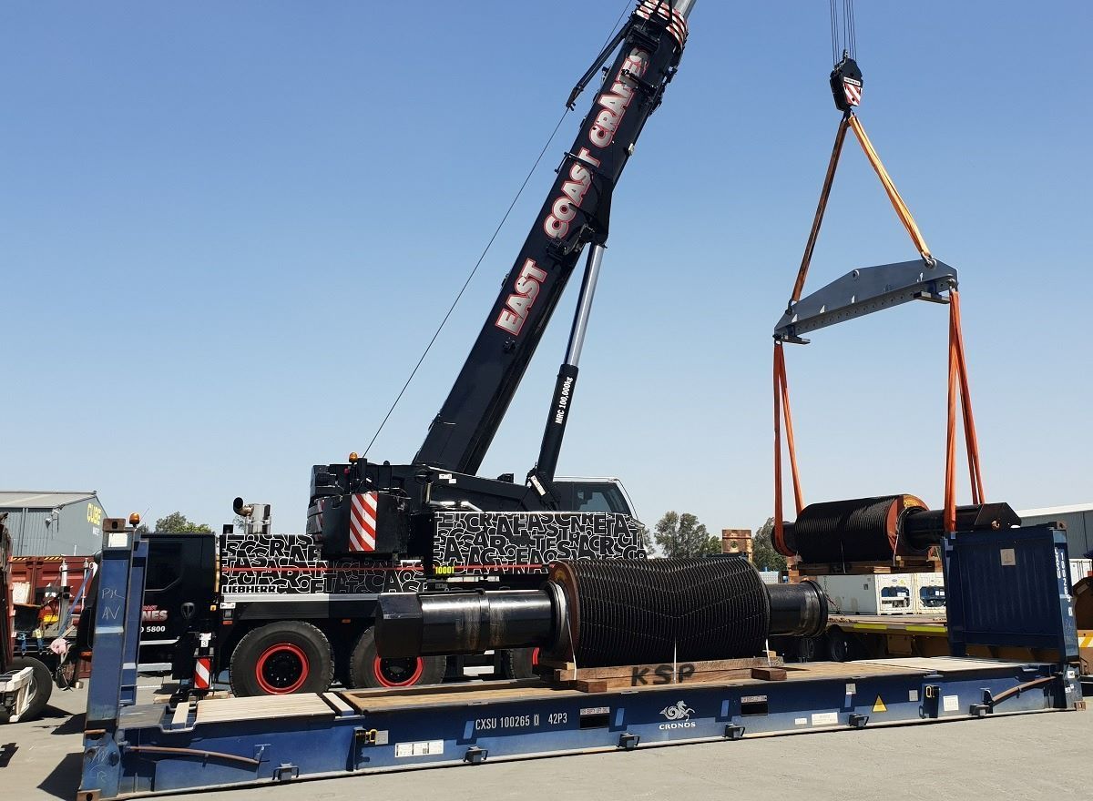 A Large East Coast Crane Is Lifting a Large Object — East Coast Cranes in Ormeau, QLD