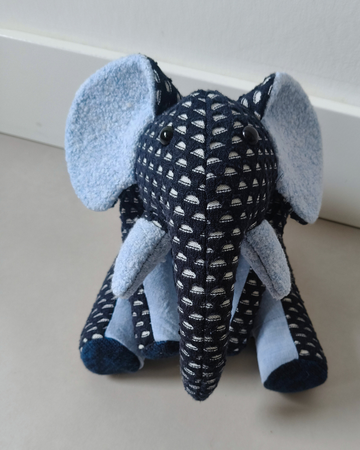 troostknuffel olifant goud onder de regenboog