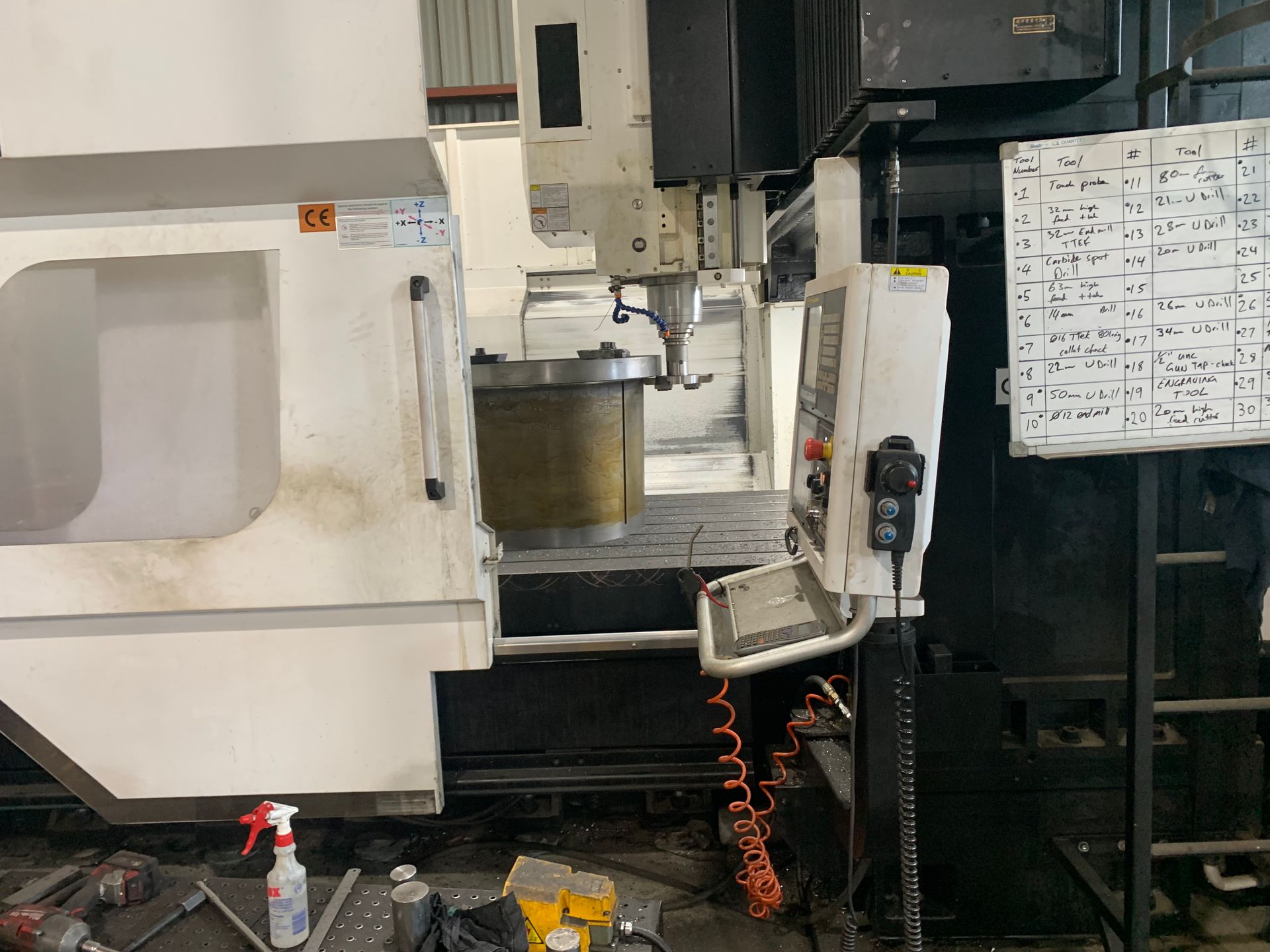 A close up of a machine cutting a piece of metal