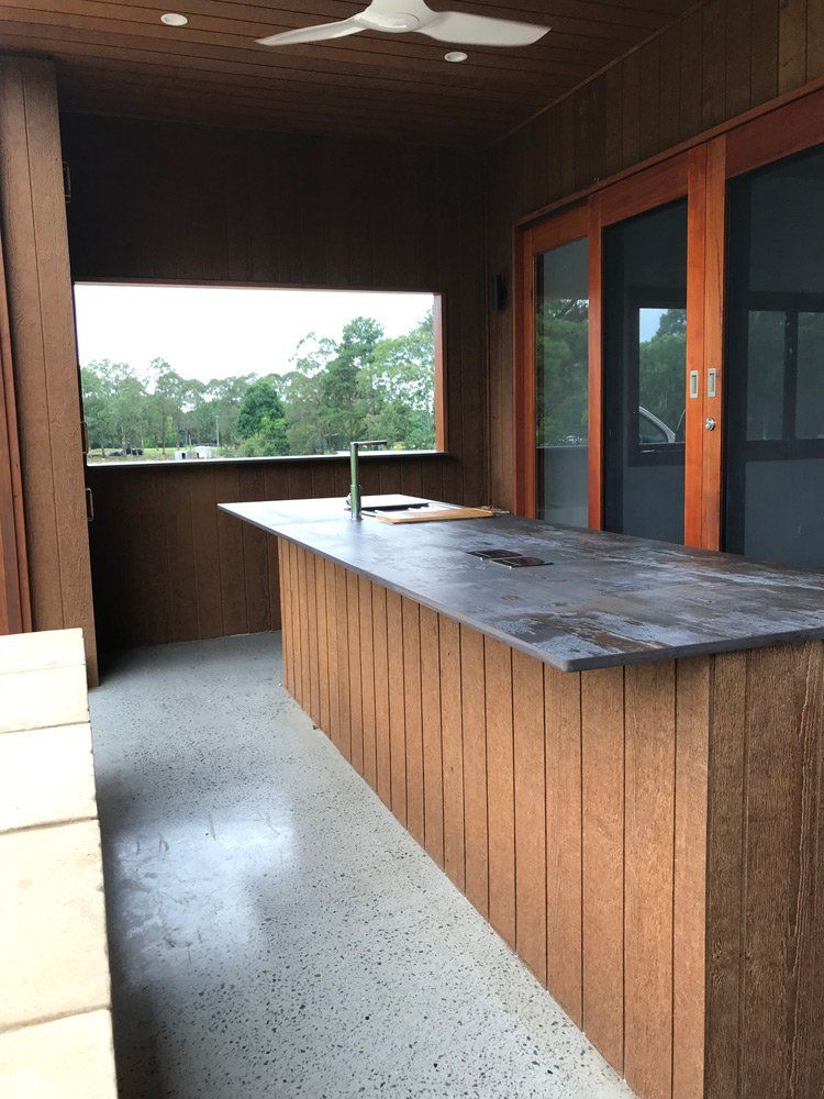 Outdoor Kitchen With Wooden Countertop  — Cabinet Makers in the Northern Rivers