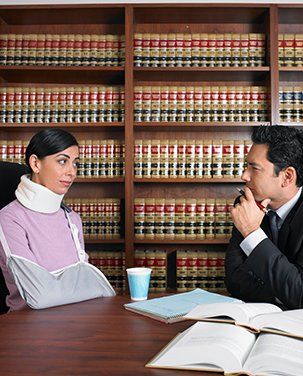 Workman's Compensation Lawyer — Woman Injury Claims Inquiry with Attorney in Indianapolis, IN