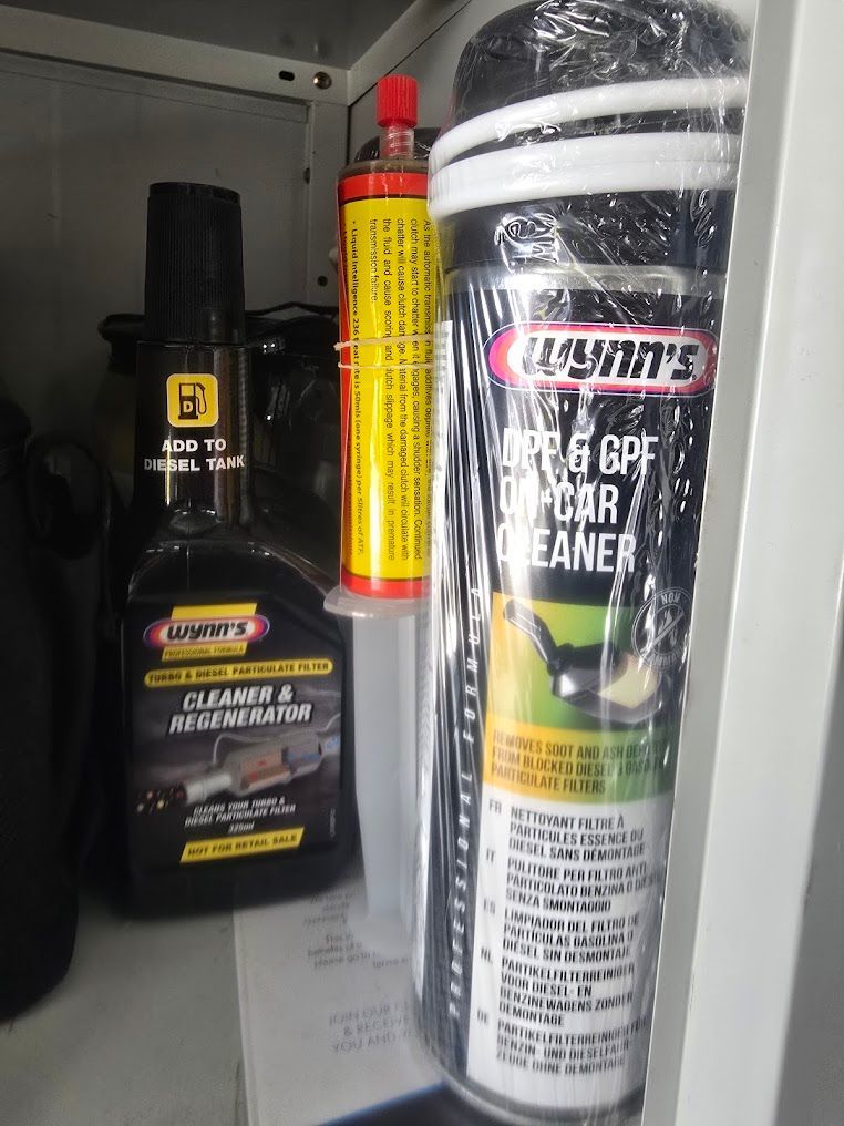 A Can Of Triple GPF Car Cleaner Sits Next To A Bottle Of Cleaner — Nuron Inspection & Service Centre In Broadmeadow, NSW