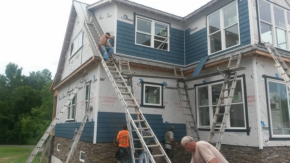 building new brick house — siding installation in Elkmont, AL