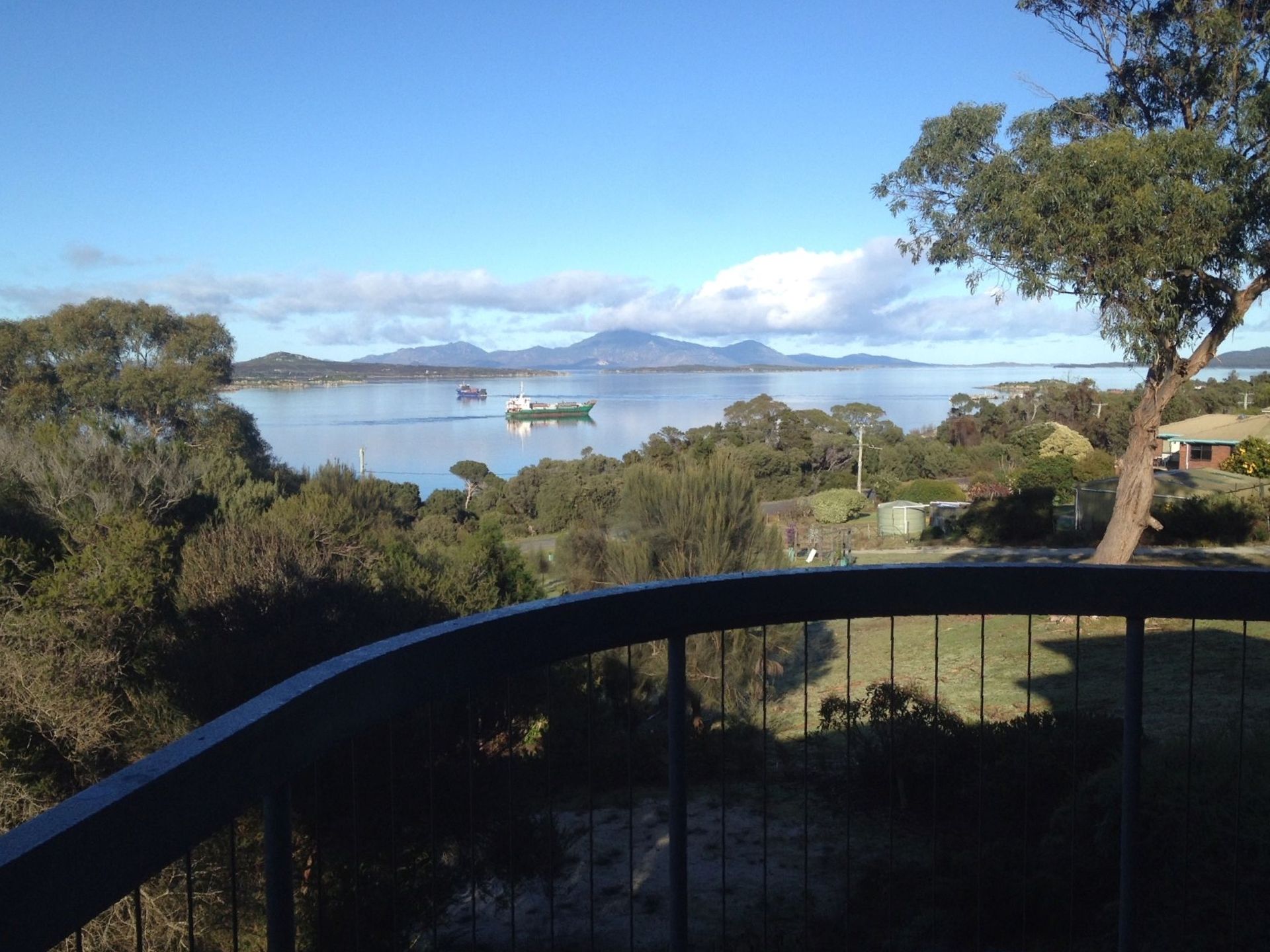 View from outside of Faraway from a small deck with ocean view
