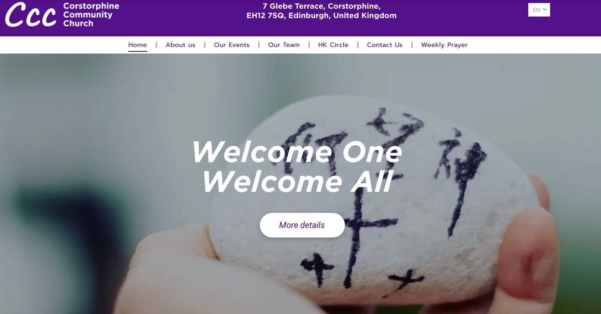 Person holding a stone with 