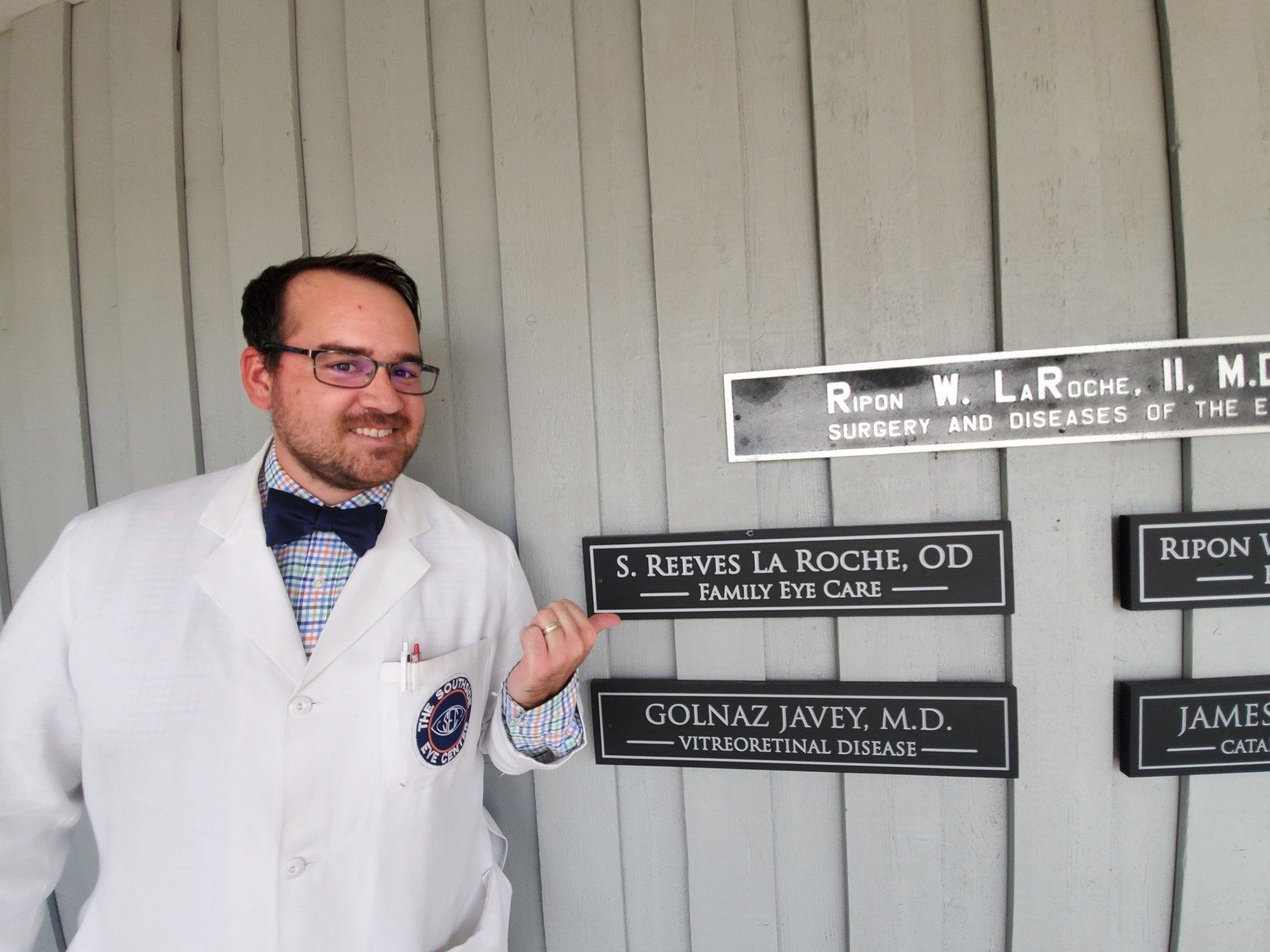 Dr. La Roche with the Name Signs – Farmville, VA – Southside Optical Center