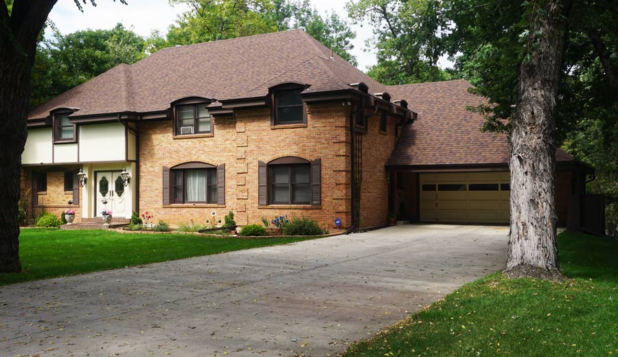 Brown House with Roof Work — Colorado Springs, CO — McWilliams Roofing