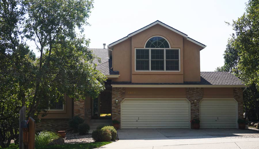 House with Garage and Window — Colorado Springs, CO — McWilliams Roofing