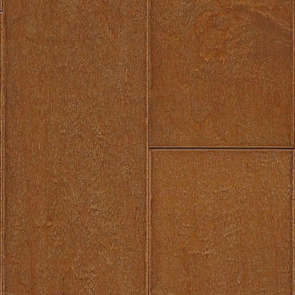 Close-up of brown, textured square floor tiles, laid in a staggered pattern.