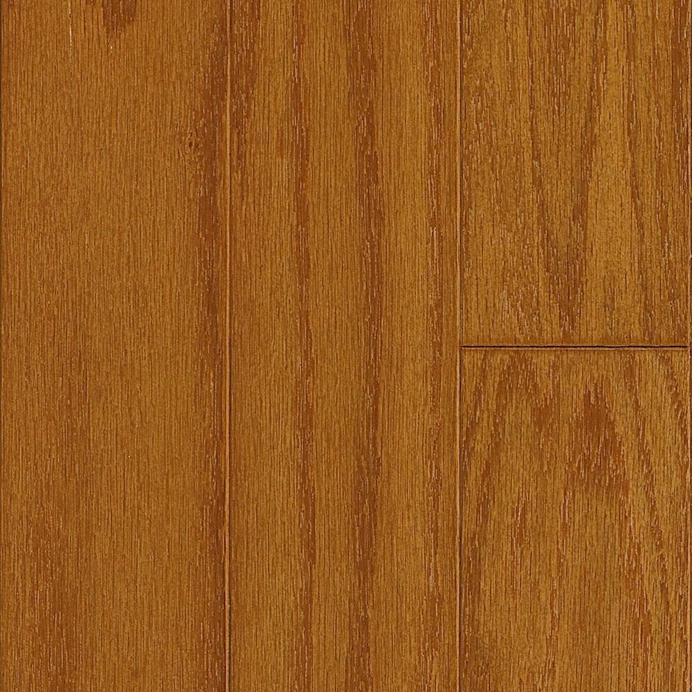 Close-up of golden-brown wood flooring planks with vertical grain and a seam.