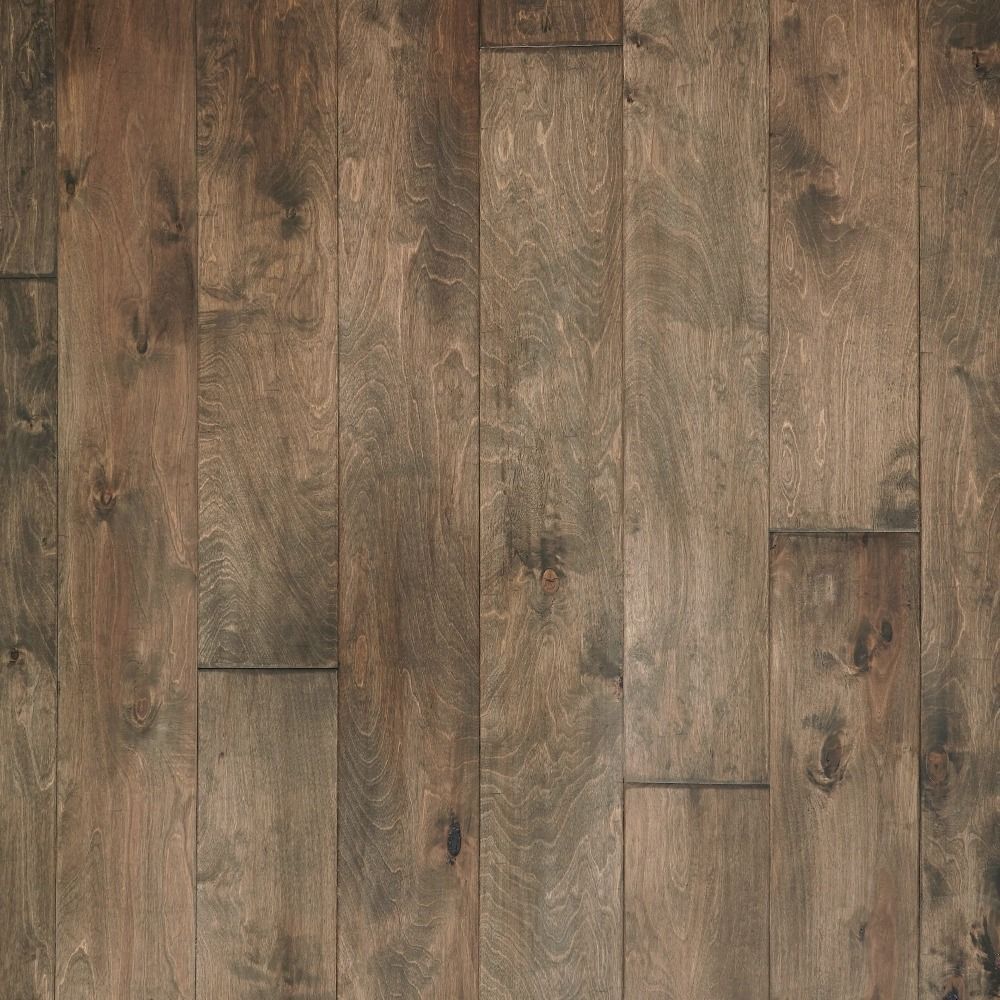 Dark brown hardwood flooring with visible grain and knots.