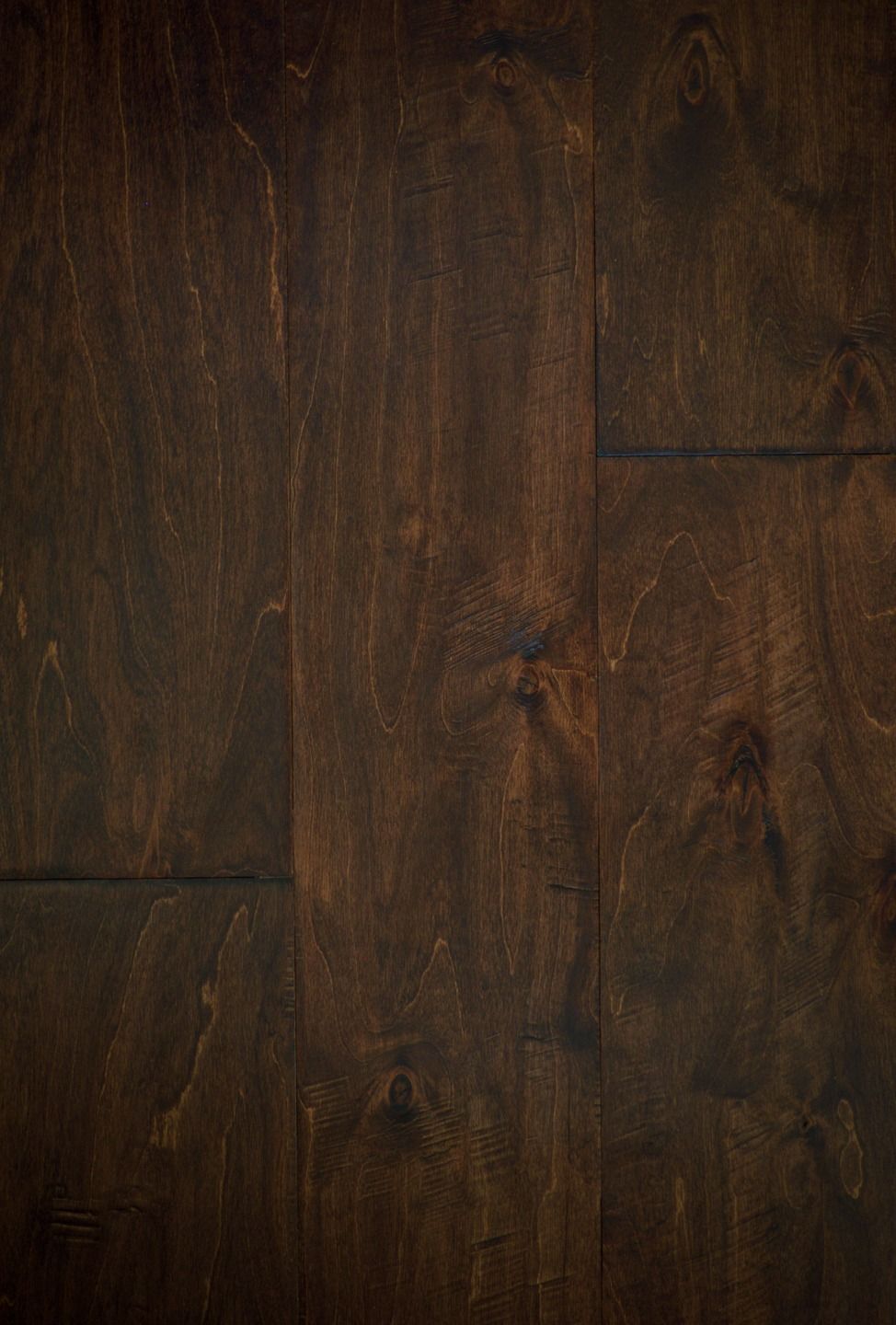 Dark stained wooden flooring with visible grain patterns.