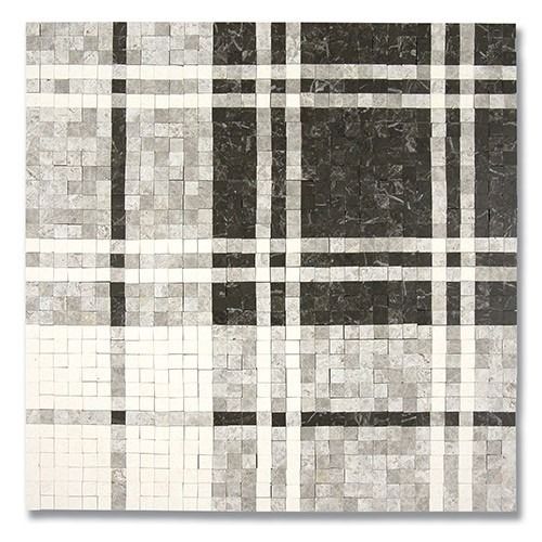Abstract mosaic of gray, black, and white squares arranged in a plaid pattern.