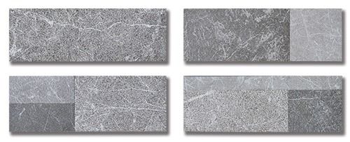Four rectangular gray stone tiles, varying textures and patterns, with a mix of darker and lighter shades.