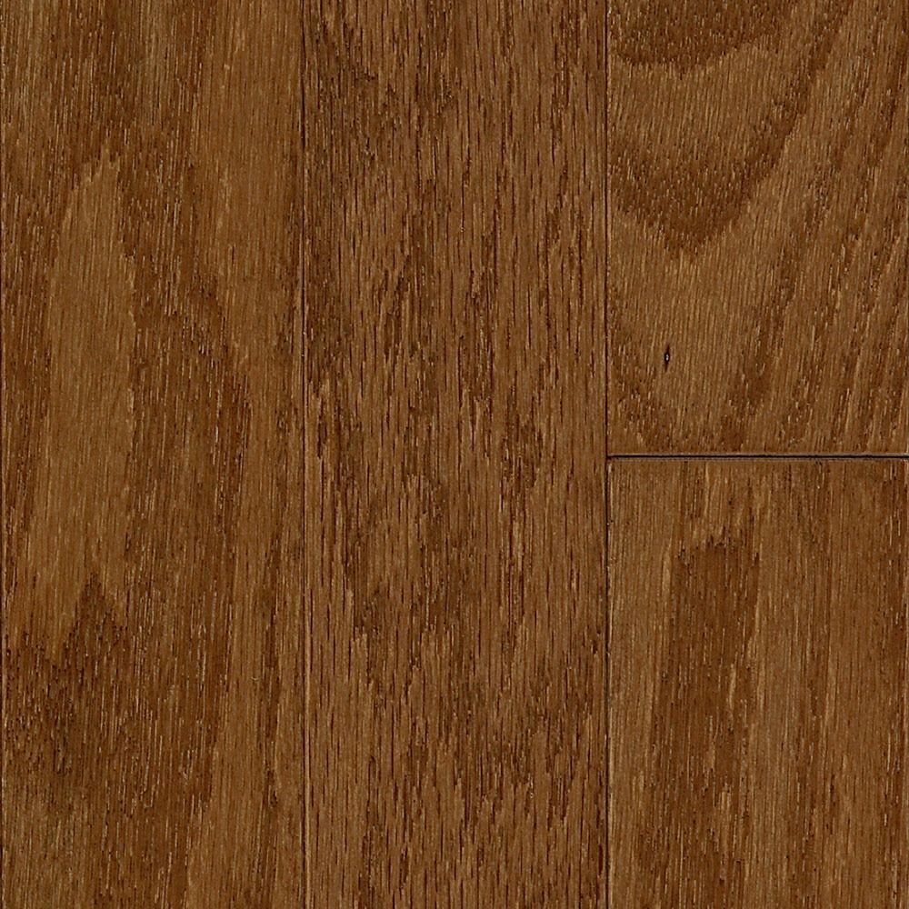 Close-up of brown hardwood flooring, showing wood grain and texture.