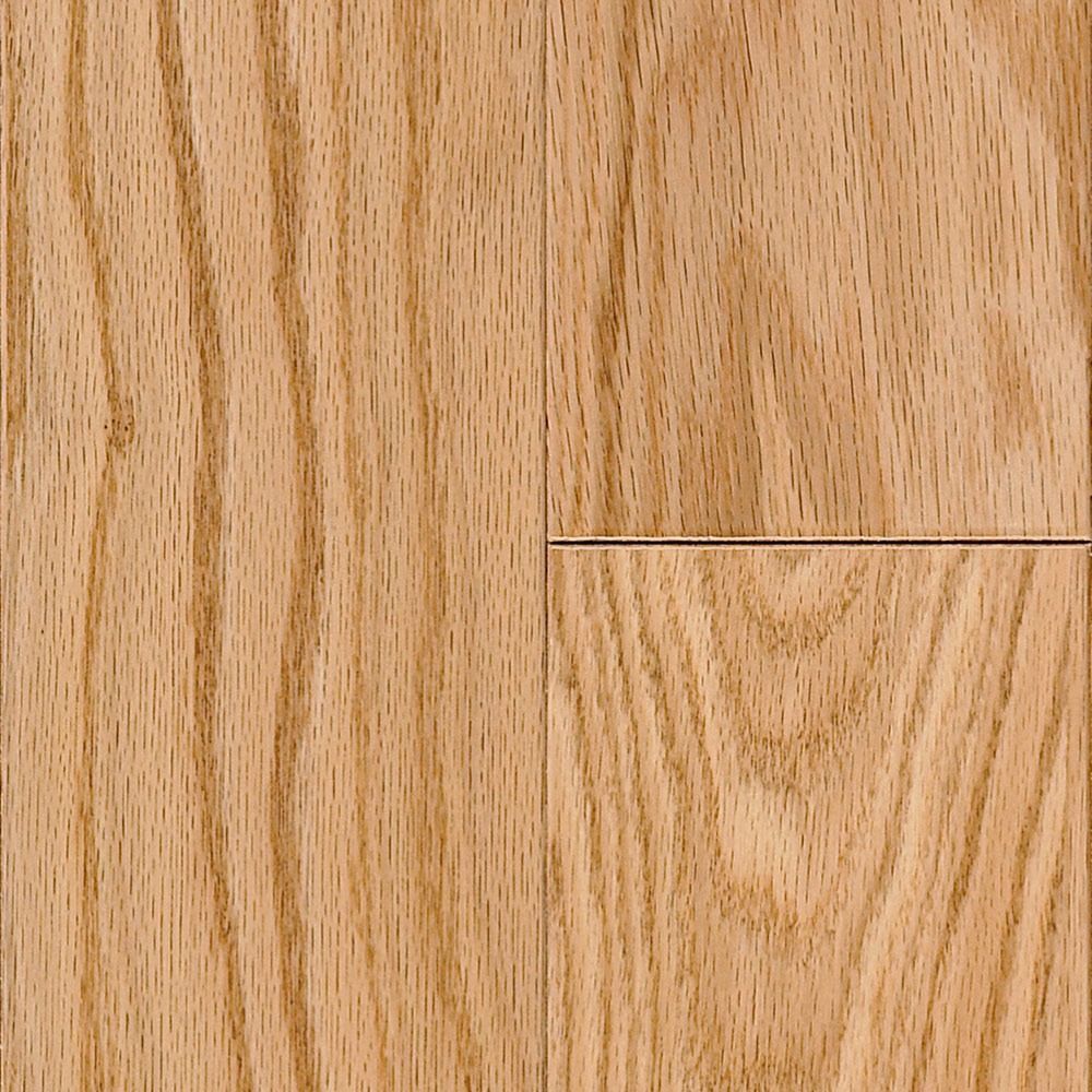 Close-up of hardwood flooring; light brown oak planks with natural wood grain.