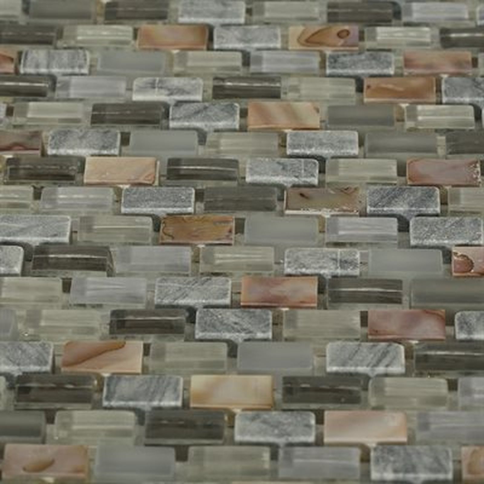 Brick-patterned mosaic tile with varying tones of grey, brown, and translucent.