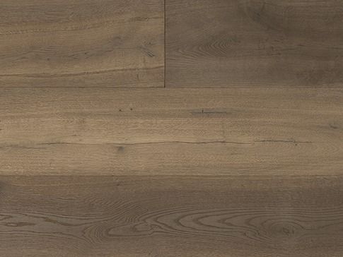 Close-up of hardwood flooring; light brown with wood grain details.