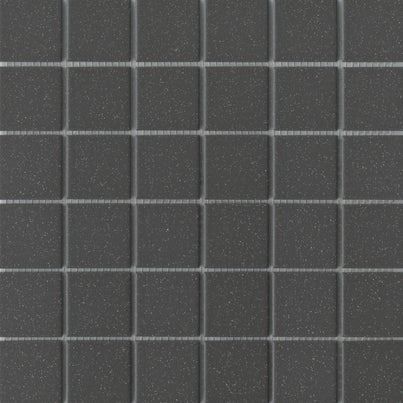 Dark gray square mosaic tile pattern with gray grout lines.