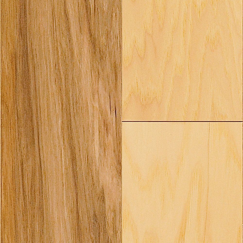 Wooden flooring sample showcasing different wood grains and tones.
