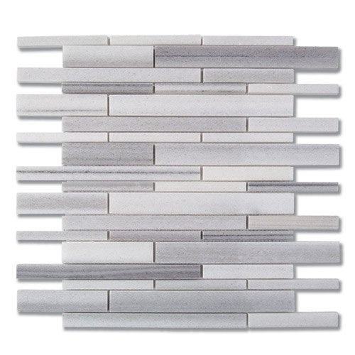 Mosaic tile with a mix of white and gray rectangular pieces in an offset pattern.