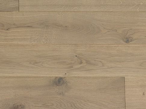 Light brown hardwood floor with wood grain and knots.