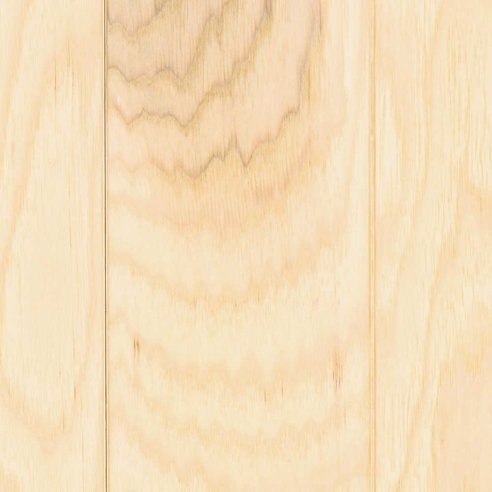 Light-colored wood planks arranged vertically, with visible grain patterns and knots.