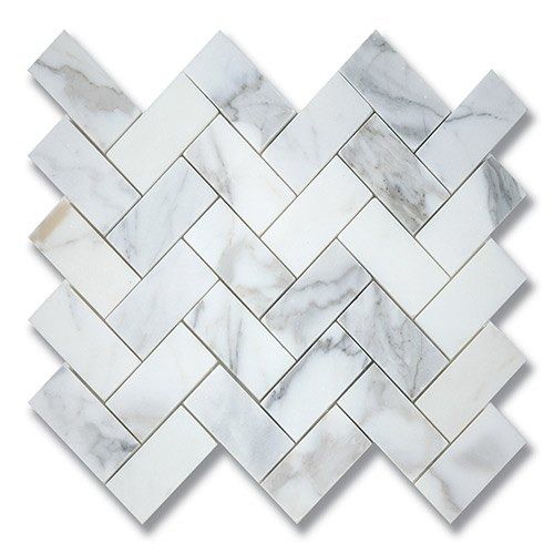 White and gray marble tile in a herringbone pattern.